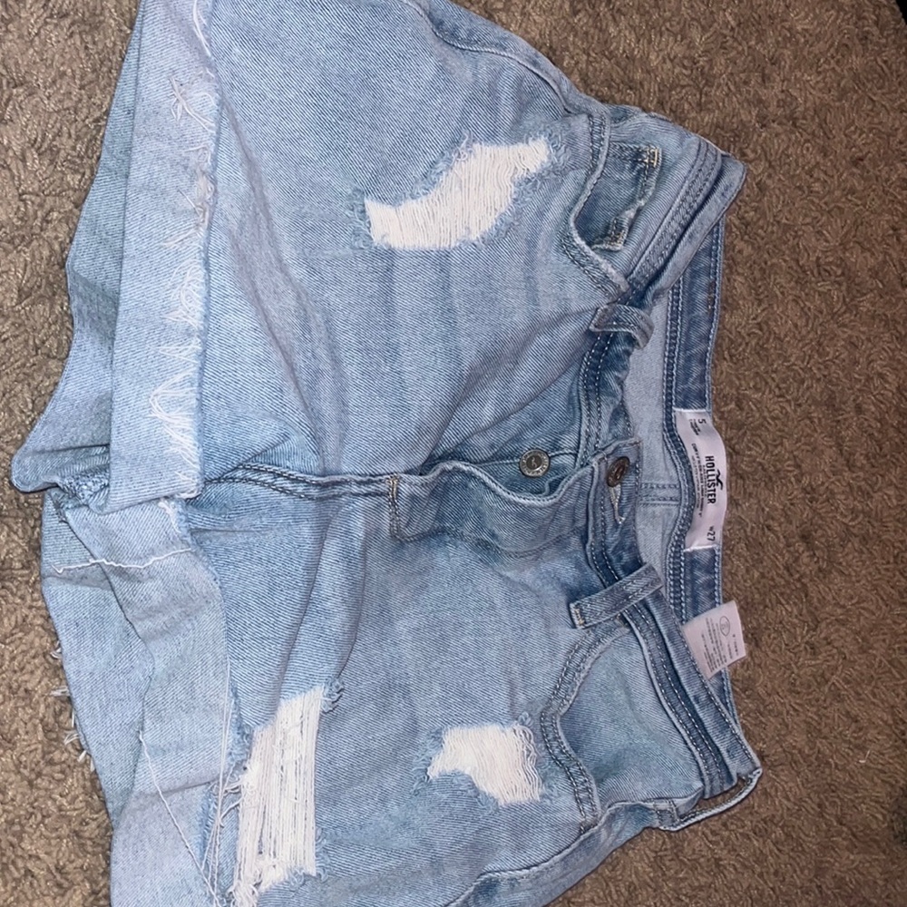 Light blue ripped jean shorts
